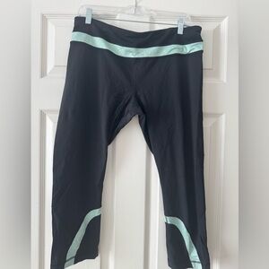 Lululemon Inspire Crop II Black Leggings with Mint Polka Dot Accents